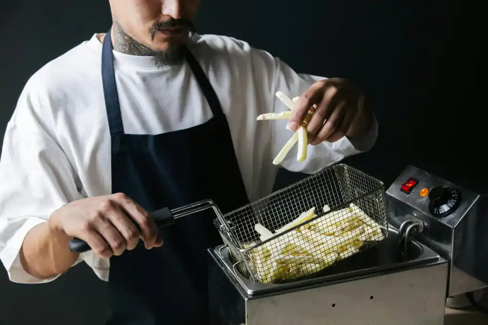 Chef using VaporKitchen air fryer